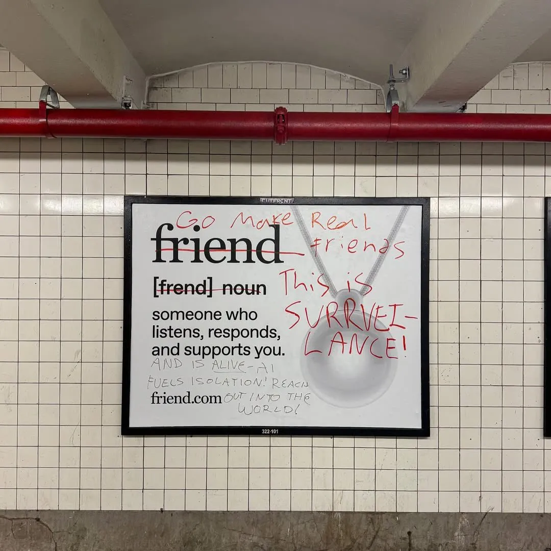 NYC subway Friend ad with handwritten graffiti criticizing the product