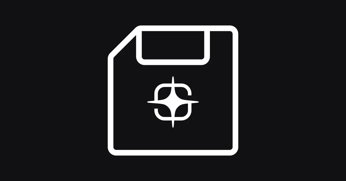 A white outline icon of a floppy disk on a dark gray background. The floppy disk has a rectangular shape with a cut corner at the top left, a small rectangular label area at the top, and a circular element in the center with a crosshair or targeting symbol inside it.
